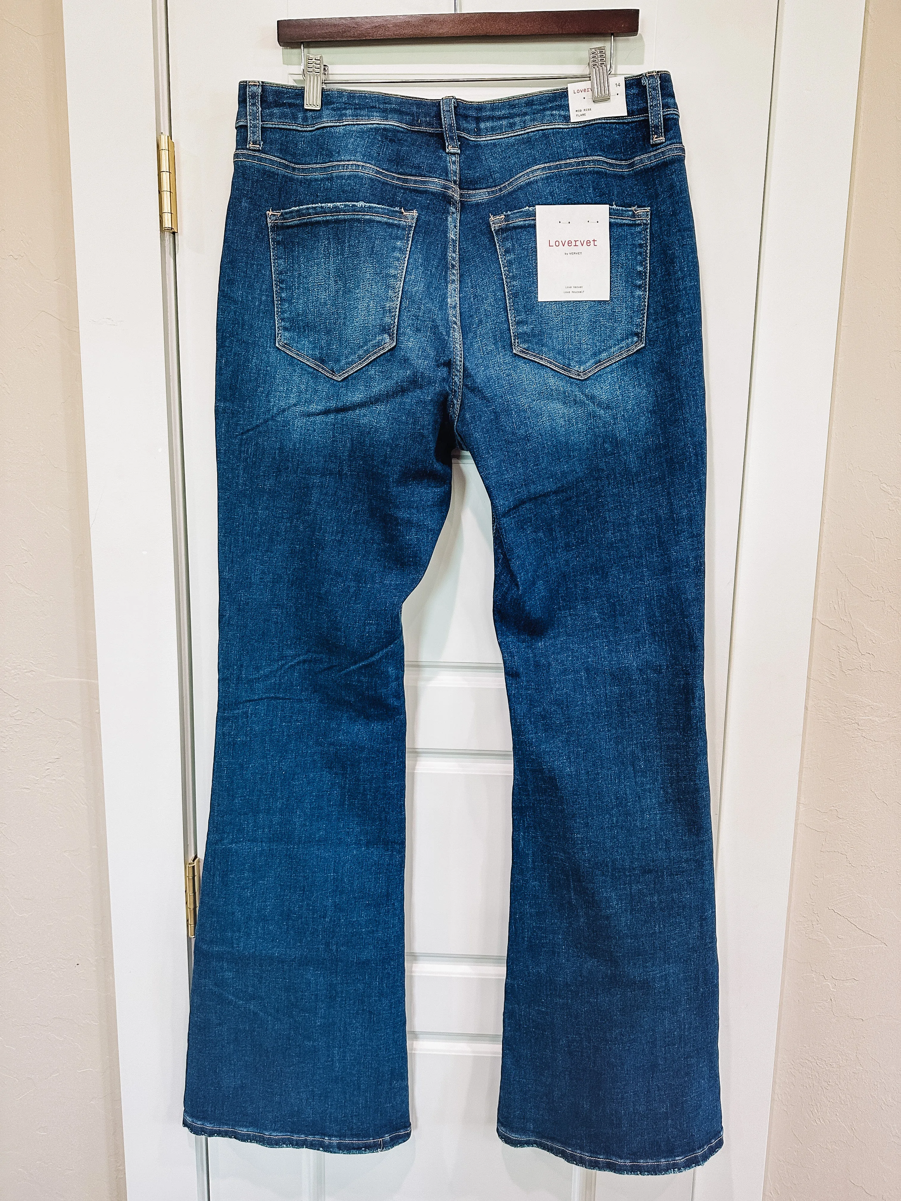 Triumphant Mid-Rise Flare Jeans